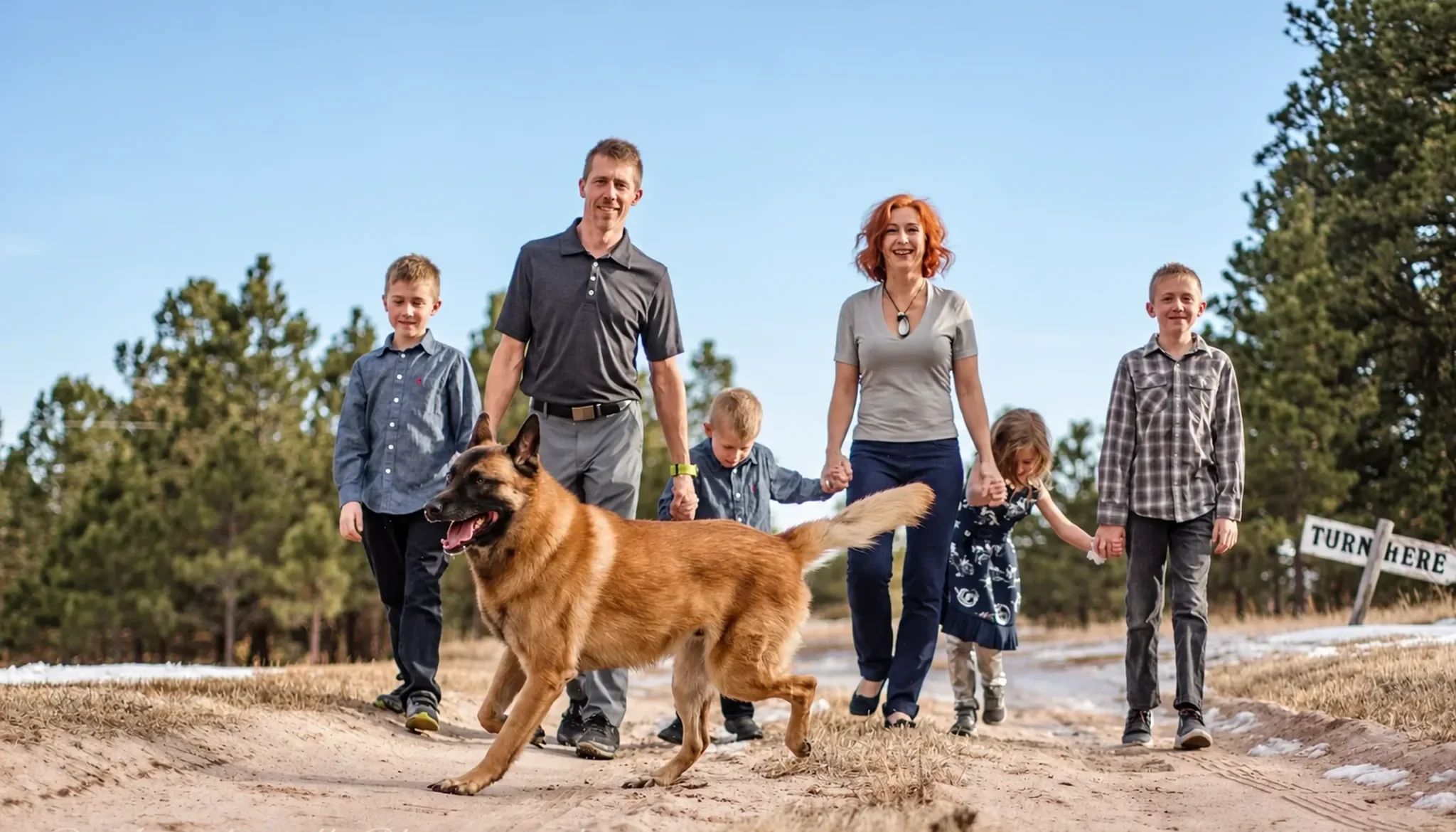 Family With Shepherd at Pinnacle K9.